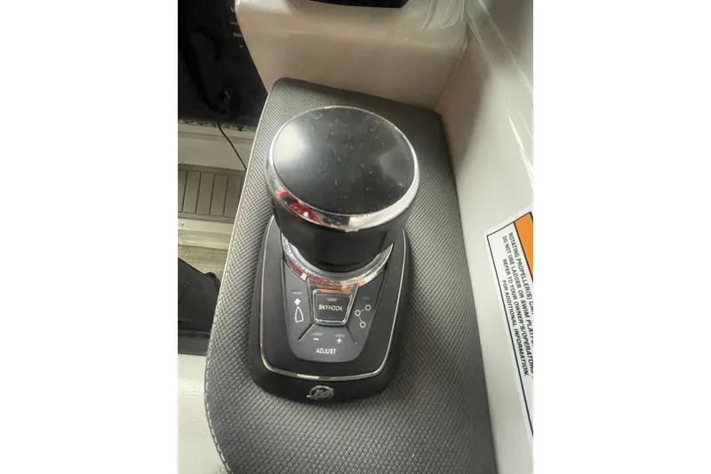 Slide: The Image of Joystick control on 2022 Finseeker 280 DC boat dashboard. - 22