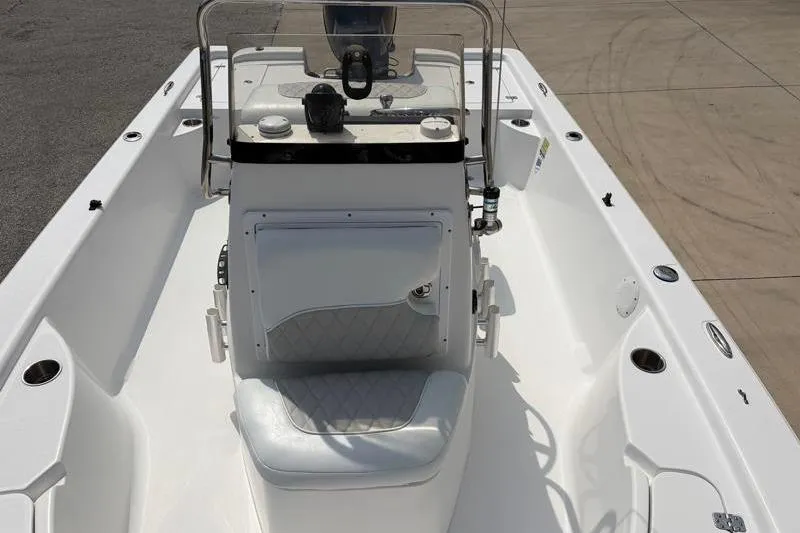 Slide: The Image of 2013 Sportsman Masters 207 Bay Boat interior with console and seating. - 21