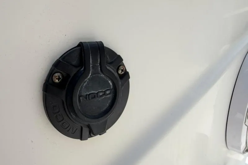 Slide: The Image of Close-up of NOCO charging port on 2013 Sportsman Masters 207 Bay Boat. - 26