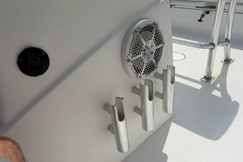 Slide: The Image of Rod holders and speaker on a 2013 Sportsman Masters 207 Bay Boat deck. - 27