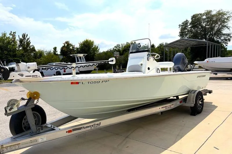 Slide: The Image of 2013 Sportsman Masters 207 Bay Boat on trailer, parked outdoors. - 3
