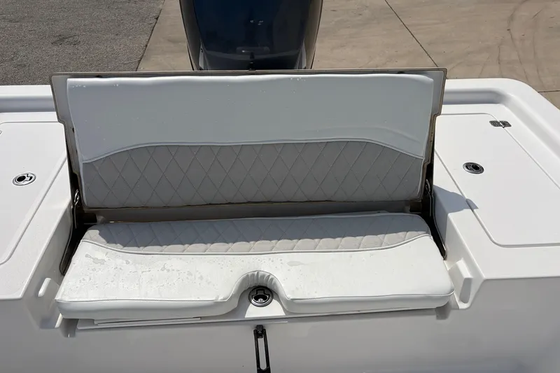 Slide: The Image of 2013 Sportsman Masters 207 Bay Boat seat with diamond-patterned upholstery. - 37
