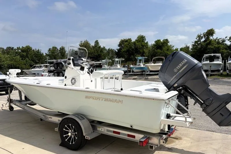 Slide: The Image of 2013 Sportsman Masters 207 Bay Boat on trailer with Yamaha outboard motor. - 5