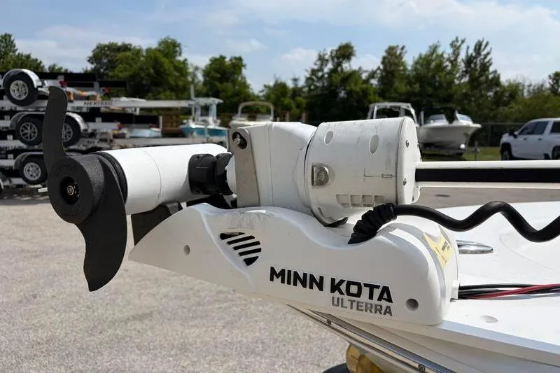 Slide: The Image of Minn Kota Ulterra trolling motor on 2013 Sportsman Masters 207 Bay Boat, parked outdoors. - 8