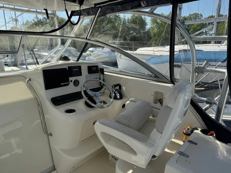 Slide: The Image of Interior view of 2006 Boston Whaler 305 Conquest cockpit. - 20