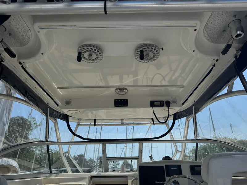 Slide: The Image of Interior view of 2006 Boston Whaler 305 Conquest boat cockpit. - 23