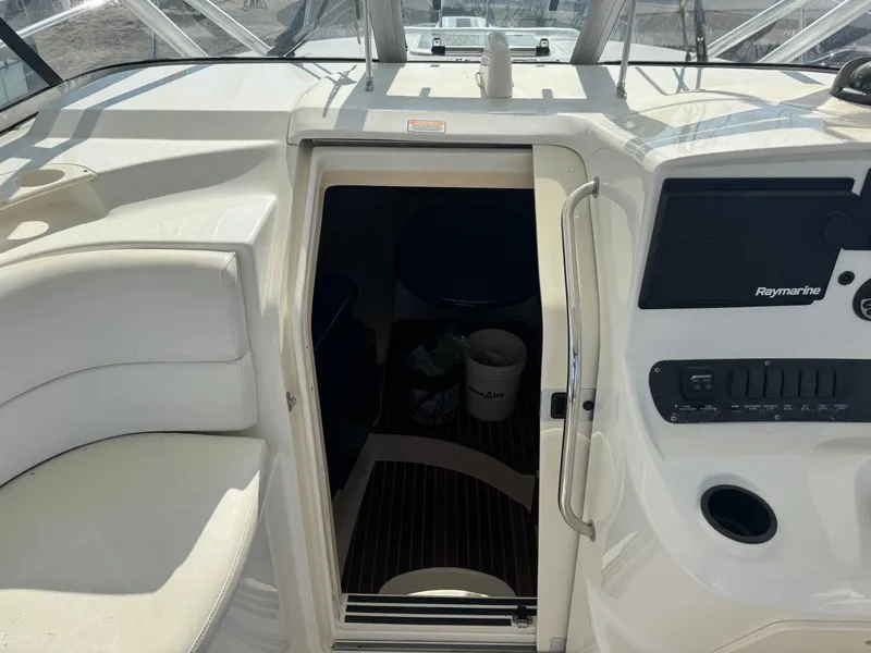 Slide: The Image of Interior of 2006 Boston Whaler 305 Conquest with Raymarine controls. - 24