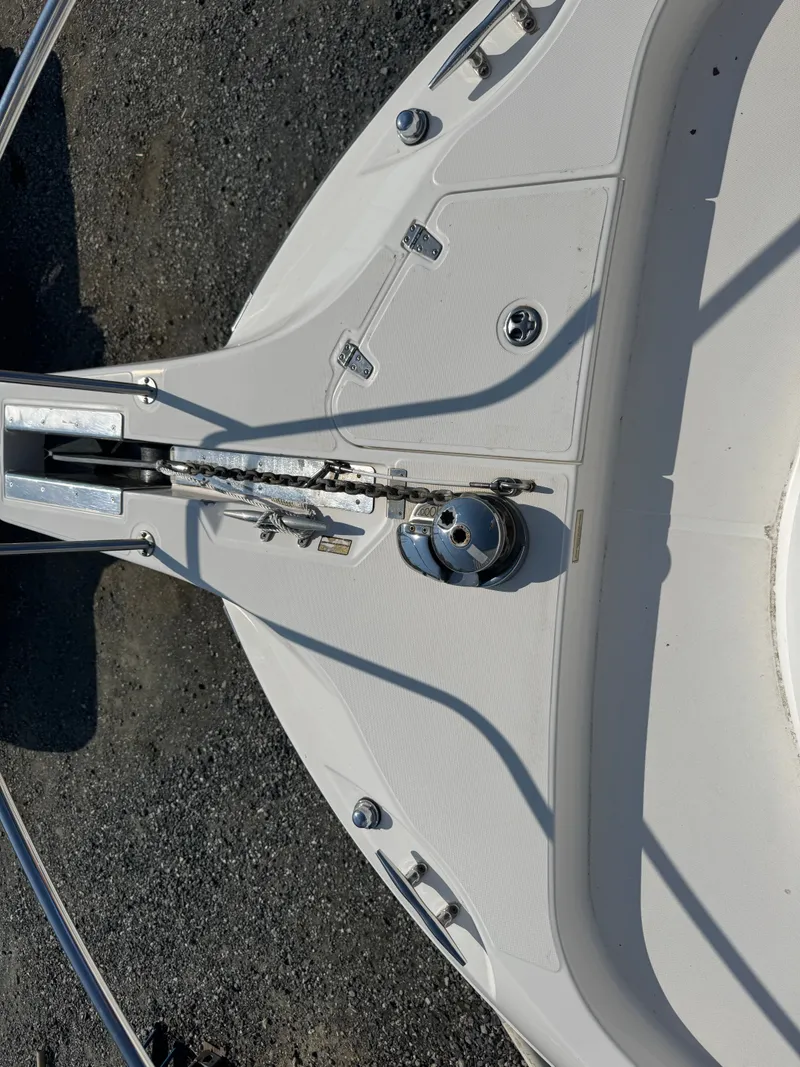 Slide: The Image of Bow view of a 2006 Boston Whaler 305 Conquest boat. - 29