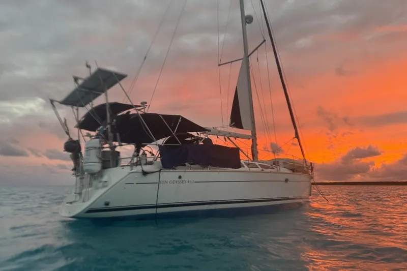 The Image of Jeanneau Sun Odyssey 40 sailboat at sunset, 2004 model, anchored on calm waters. - 0