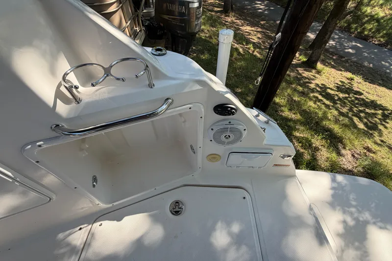 Slide: The Image of 2008 Regal 2565 Window Express boat deck with cup holders and speaker. - 14