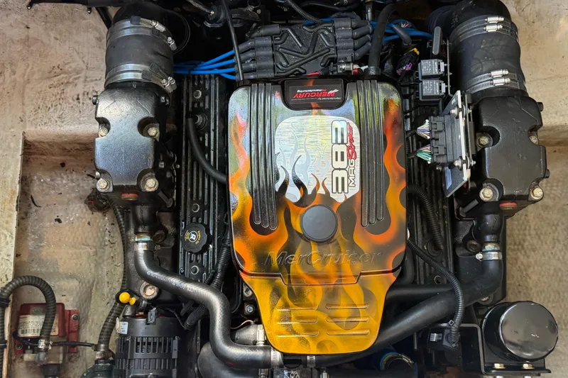 Slide: The Image of Engine of a 2008 Regal 2565 Window Express boat with custom flame design. - 25