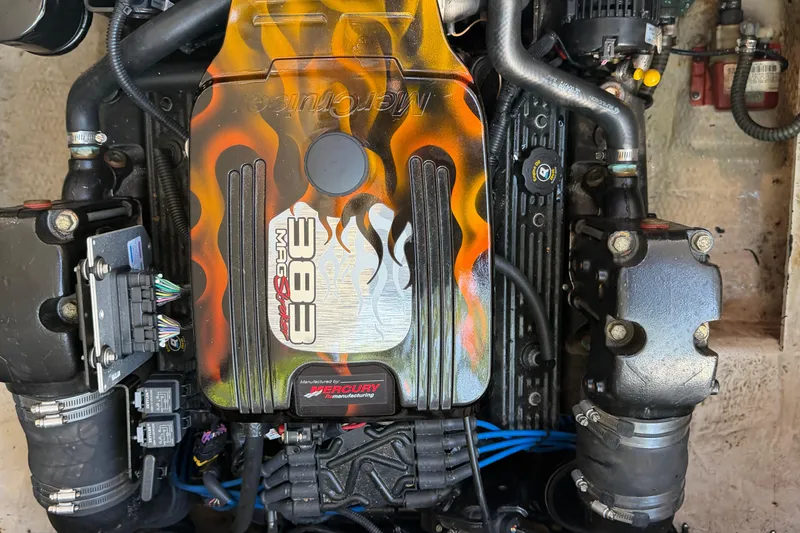 Slide: The Image of Engine of 2008 Regal 2565 Window Express with custom flame design on cover. - 26