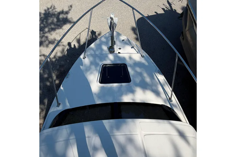 Slide: The Image of Top view of a 2008 Regal 2565 Window Express boat, showing deck and railing. - 3