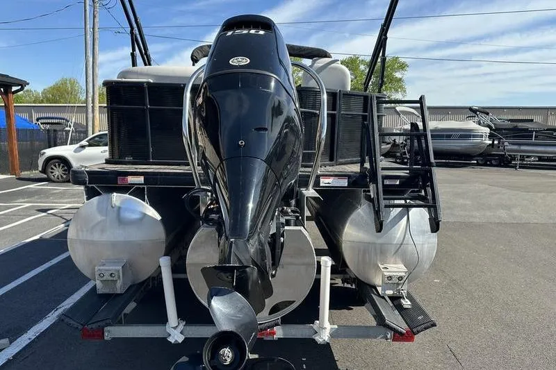 Slide: The Image of 2022 Godfrey Sweetwater 2186 C4 pontoon boat with powerful outboard motor. - 11