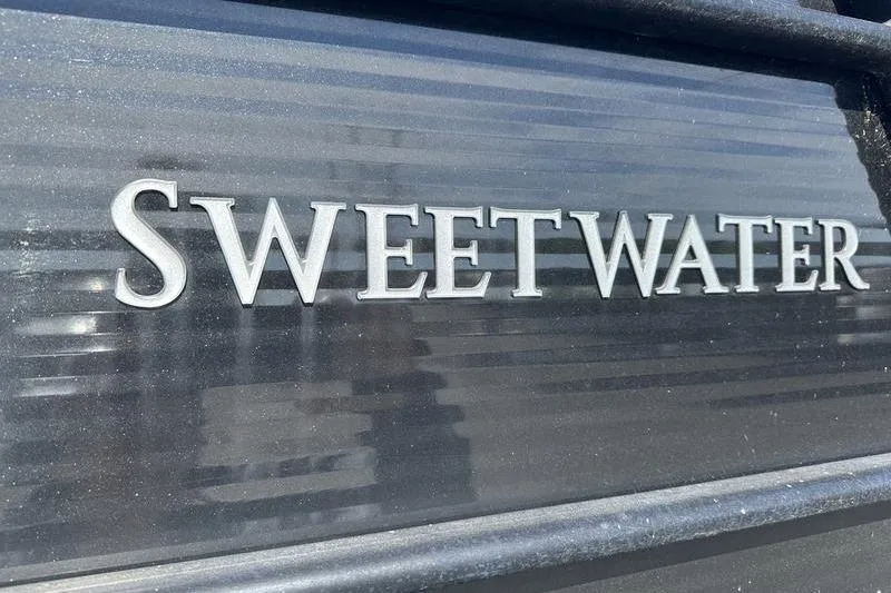 Slide: The Image of Sweetwater logo on 2022 Godfrey Sweetwater 2186 C4 boat exterior. - 14