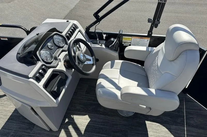 Slide: The Image of Captain's seat and console of 2022 Godfrey Sweetwater 2186 C4 pontoon boat. - 22
