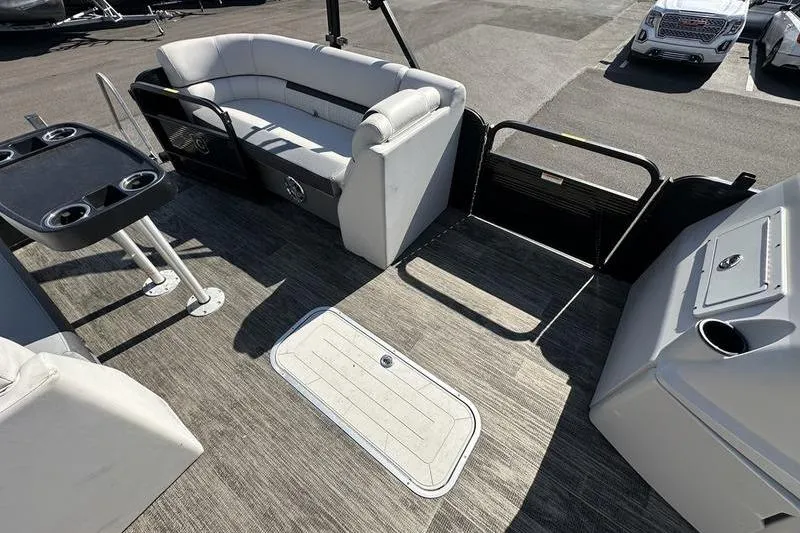 Slide: The Image of Interior of 2022 Godfrey Sweetwater 2186 C4 pontoon boat with seating and table. - 24