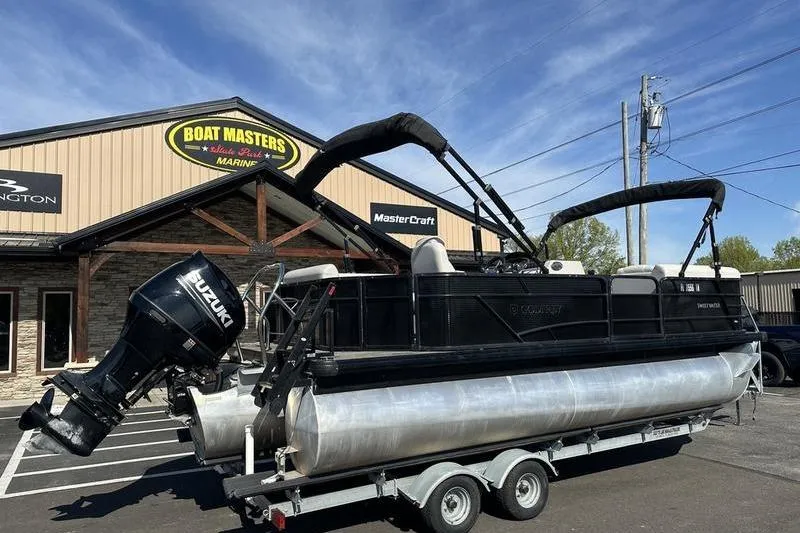 Slide: The Image of 2022 Godfrey Sweetwater 2186 C4 pontoon boat on trailer at Boat Masters dealership. - 4
