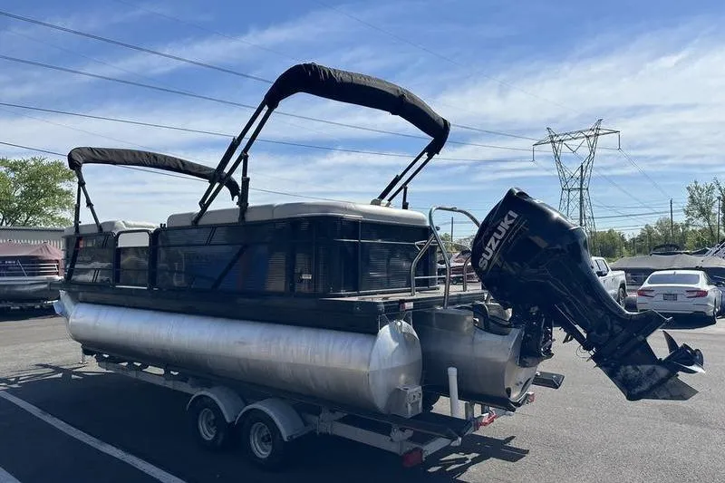 Slide: The Image of 2022 Godfrey Sweetwater 2186 C4 pontoon boat with Suzuki outboard motor on trailer. - 7