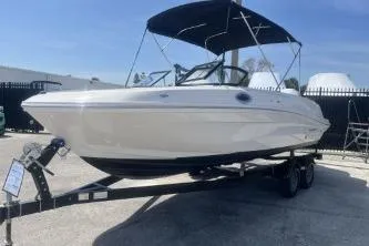Slide: The Image of 2022 Bayliner VR6 Bowrider OB on trailer, featuring sleek design and canopy. - 4