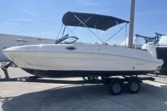 Slide: The Image of 2022 Bayliner VR6 Bowrider OB on trailer, featuring sleek design and canopy. - 5