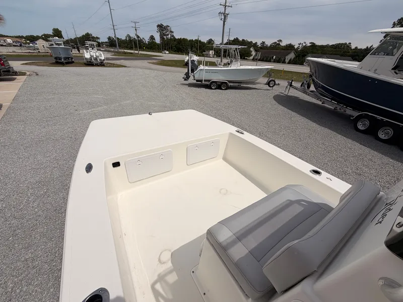 Slide: The Image of 2022 KenCraft Bay Rider 2060 boat parked on gravel lot. - 10