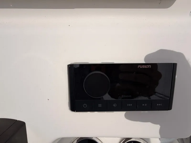 Slide: The Image of Fusion Bluetooth control on KenCraft Bay Rider 2060, year 2022. - 16