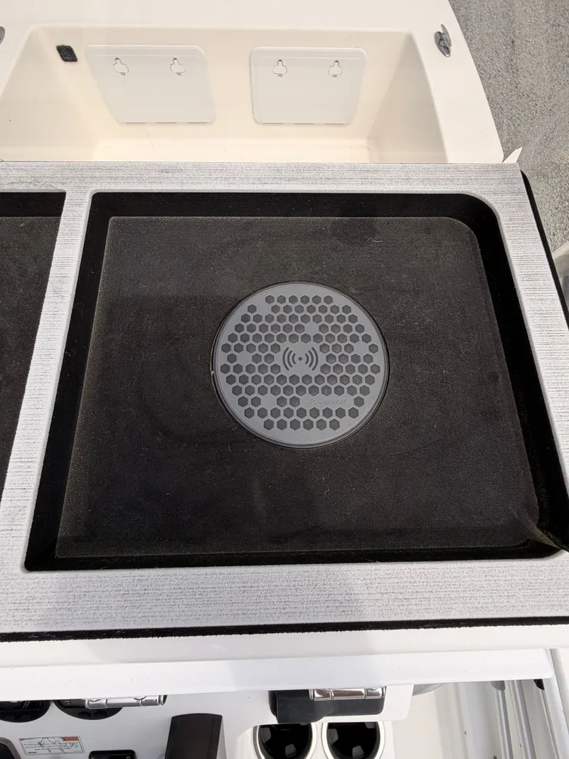 Slide: The Image of Charging pad on KenCraft Bay Rider 2060 boat, year 2022. - 20