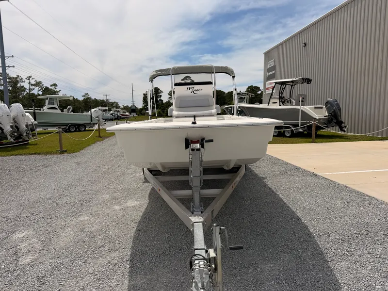 Slide: The Image of 2022 KenCraft Bay Rider 2060 boat on trailer outside warehouse. - 3