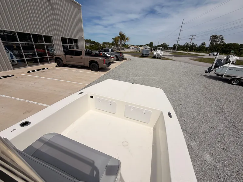 Slide: The Image of KenCraft Bay Rider 2060 boat from 2022 parked outside building. - 9