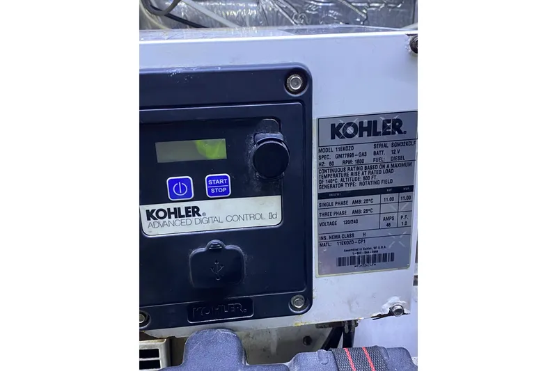 Slide: The Image of Kohler generator control panel on 1986 Ocean Yachts 48 Super Sport. - 20