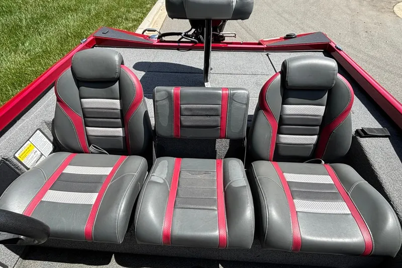 Slide: The Image of 2024 Ranger RT188 boat seats with gray and red upholstery, showcasing modern design. - 11