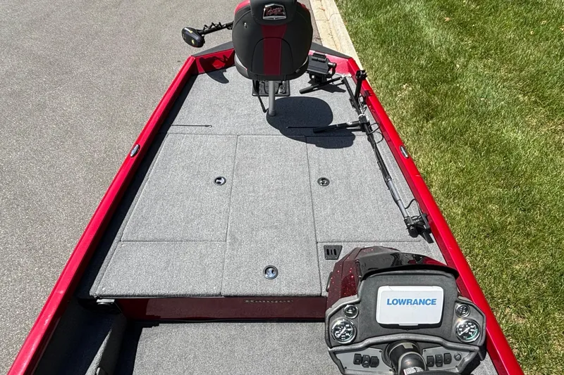 Slide: The Image of 2024 Ranger RT188 boat deck with Lowrance electronics and red trim. - 6