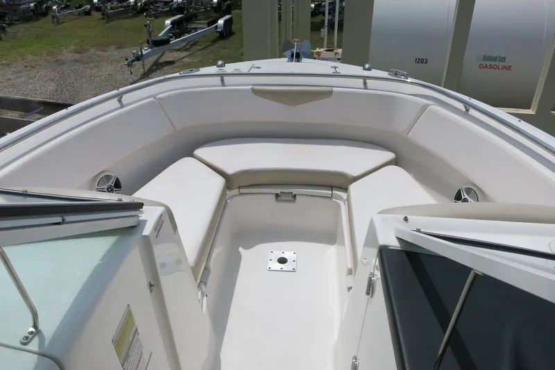 Slide: The Image of 2018 Robalo R247 Dual Console boat interior with spacious seating and modern design. - 16