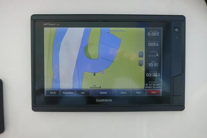 Slide: The Image of Garmin GPS display on 2018 Robalo R247 Dual Console boat, showing navigation map and data. - 28