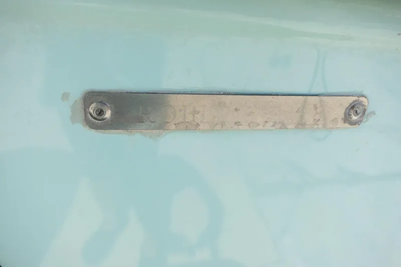 Slide: The Image of Metal plate on a 2018 Robalo R247 Dual Console boat hull. - 29