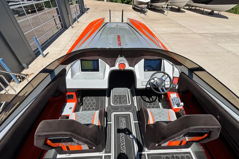 Slide: The Image of 2020 Eliminator 36 Daytona Coupe cockpit with modern controls and sleek design. - 12