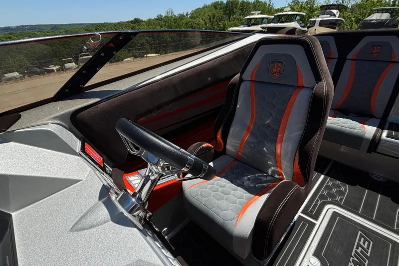 Slide: The Image of Interior of a 2020 Eliminator 36 Daytona Coupe with stylish seating and steering. - 30
