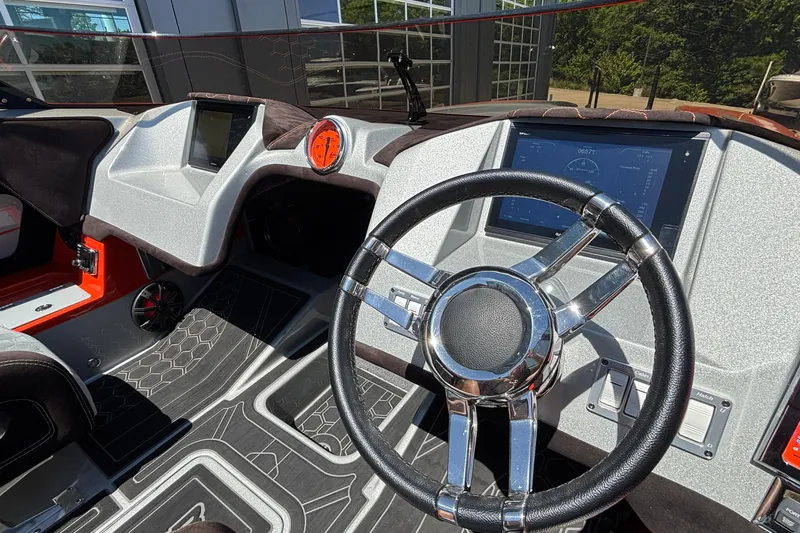Slide: The Image of Interior of 2020 Eliminator 36 Daytona Coupe with modern dashboard and steering wheel. - 35