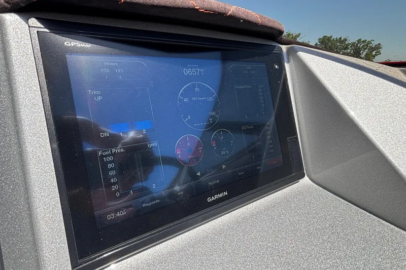 Slide: The Image of Garmin GPS display in 2020 Eliminator 36 Daytona Coupe showing speed and fuel pressure. - 37
