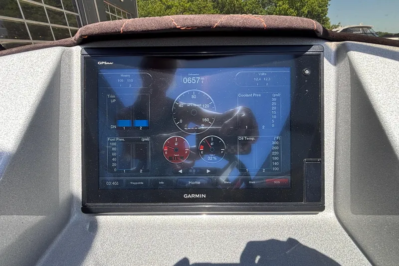 Slide: The Image of Garmin display in 2020 Eliminator 36 Daytona Coupe showing engine metrics and navigation data. - 38
