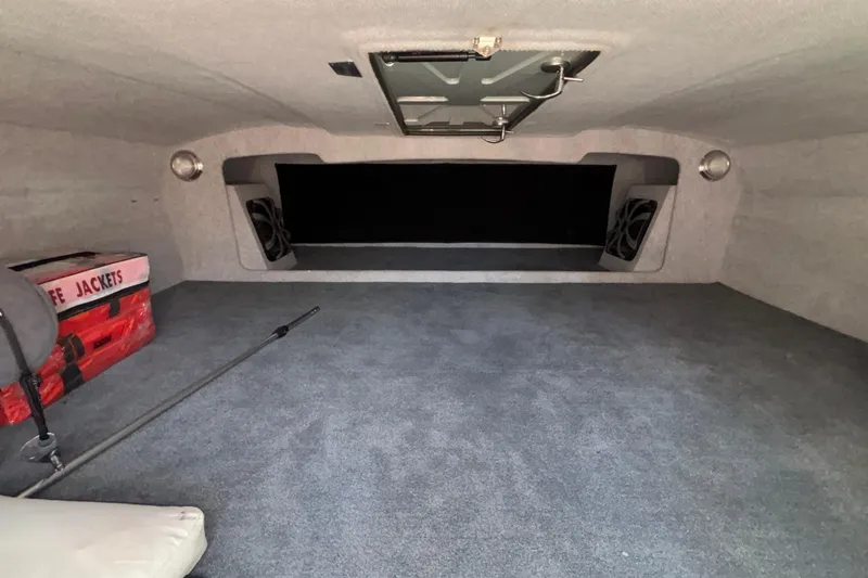 Slide: The Image of Interior of 2020 Eliminator 36 Daytona Coupe with life jackets and carpeted flooring. - 42