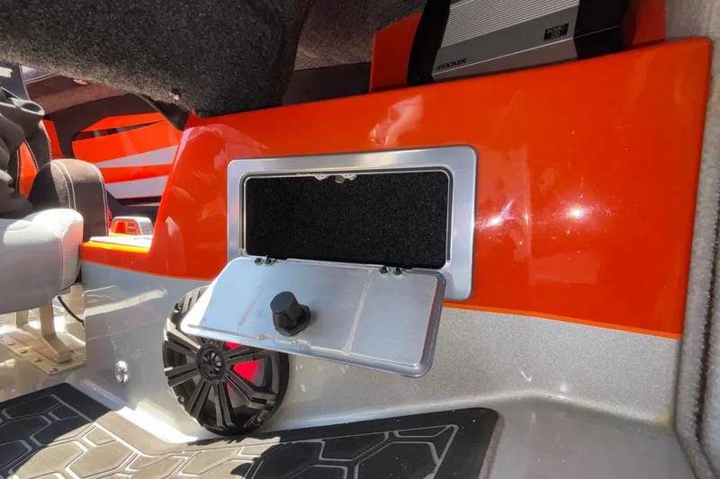 Slide: The Image of Interior of 2020 Eliminator 36 Daytona Coupe with orange accents and audio system. - 47