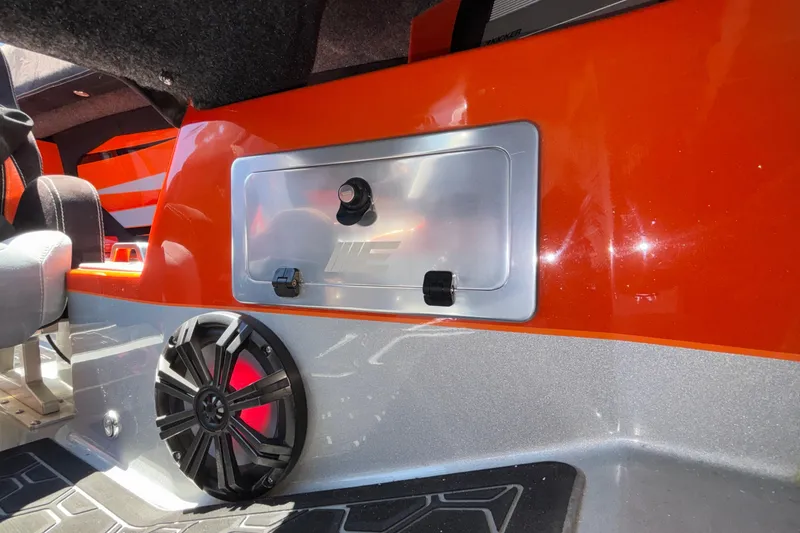 Slide: The Image of Interior of 2020 Eliminator 36 Daytona Coupe with vibrant orange and silver design. - 48