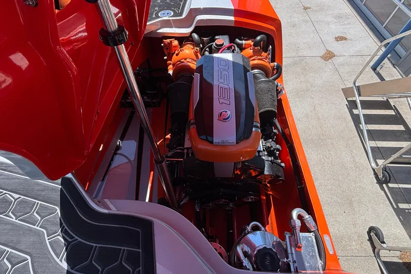 Slide: The Image of Engine compartment of a 2020 Eliminator 36 Daytona Coupe with vibrant orange detailing. - 51