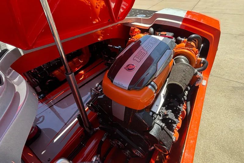 Slide: The Image of 2020 Eliminator 36 Daytona Coupe engine, showcasing powerful performance components in vibrant orange. - 52