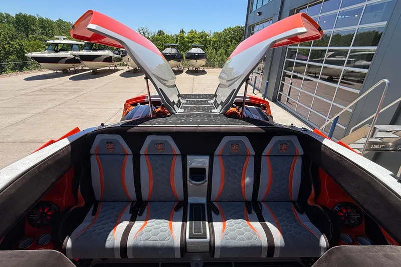 Slide: The Image of 2020 Eliminator 36 Daytona Coupe with open gullwing doors, showcasing interior seating. - 53