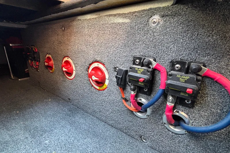 Slide: The Image of Electrical panel in 2020 Eliminator 36 Daytona Coupe with switches and circuit breakers. - 62