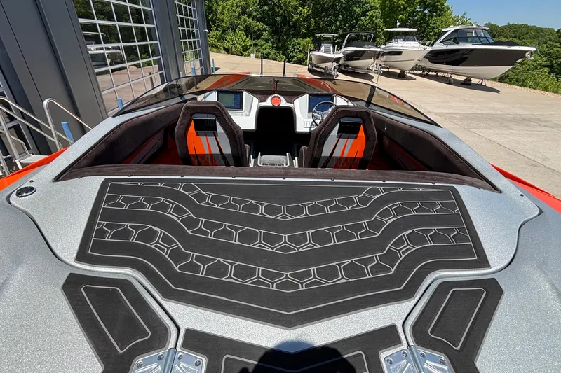 Slide: The Image of 2020 Eliminator 36 Daytona Coupe boat interior with sleek design and modern dashboard. - 64