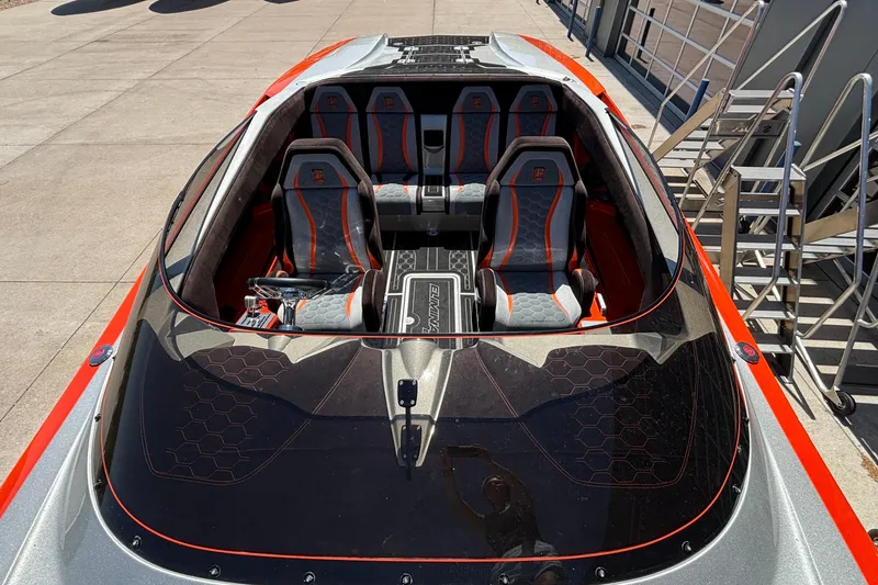 Slide: The Image of 2020 Eliminator 36 Daytona Coupe boat interior with sleek seating and modern design. - 7